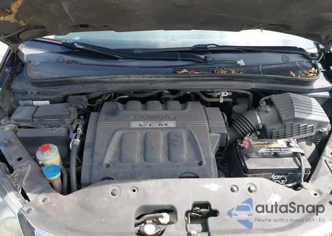 2009 Honda Odyssey Ex-L from USA, damaged, VIN 5FNRL387X9B008400